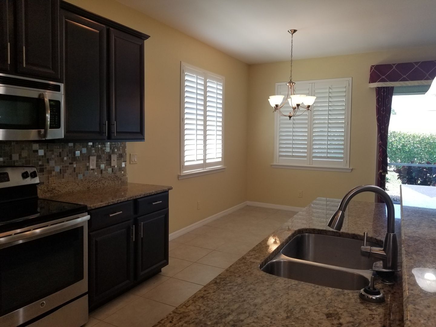 Building Photo - Celebration Cape - Gated Community - 3/2+Den/2 car garage