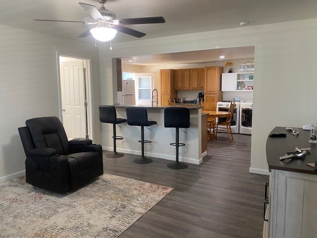 living room looking to kitchen - 6044 E Highway 20