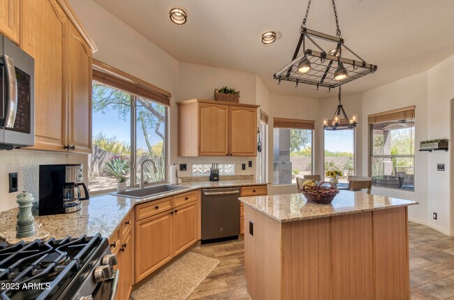 Building Photo - 6879 E Amber Sun Dr
