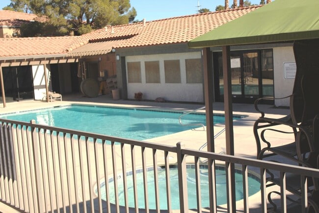 Building Photo - THIS SECOND-FLOOR DESERT SHORES CONDO OFFE...