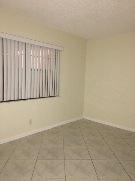 Building Photo - 9125 W Highland Pines Dr