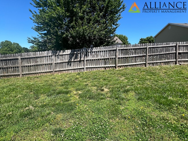 Building Photo - NEWLY PAINTED! Walk Out Basement & Much, Much More!