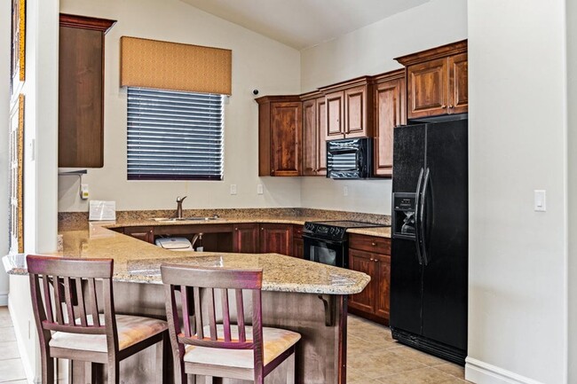 Building Photo - Bella Terrazza FURNISHED CONDO  --  Golf C...
