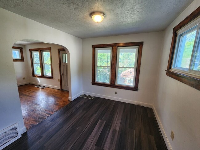 Building Photo - 4 BR home with first-floor living, new roof, and a private-feeling backyard in Lincoln Place