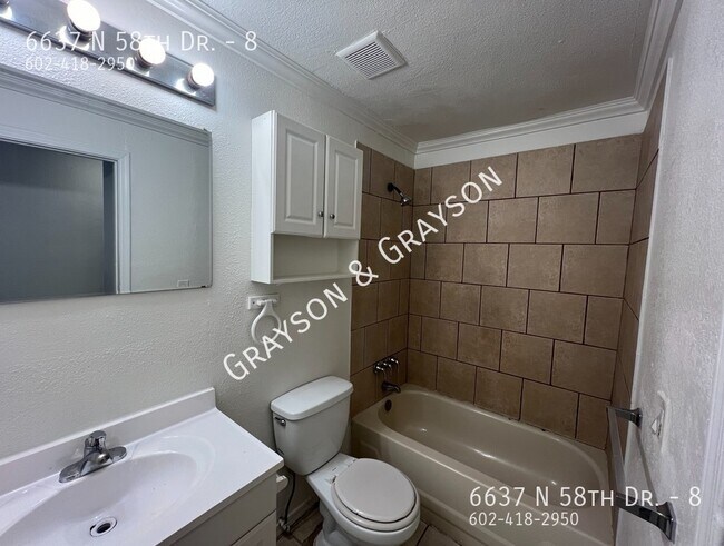 Building Photo - 6637 N 58th Dr