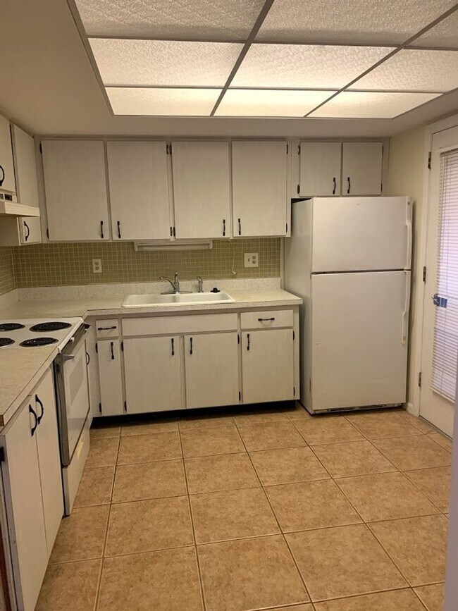 Building Photo - First Month Free !!!!!  Huge two bedroom two bath condominium 55+