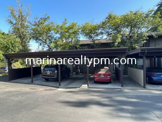 Building Photo - Two Story Crockett Condo Two-Off Street Pa...