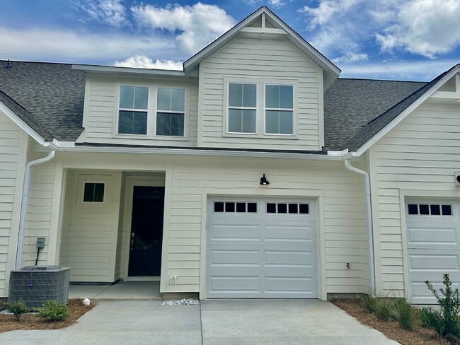 Building Photo - Three Bedroom, Brand New Town Home w/ Garage!