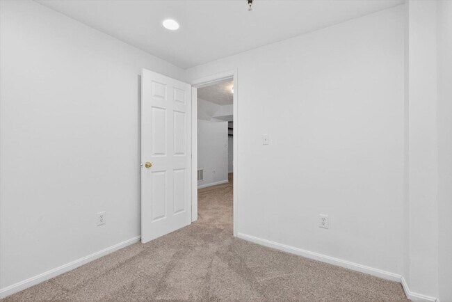 Building Photo - 3BR Townhome in Russett | 3 Levels | Walkout Basement + Deck | $2,400/mo** Beautiful 3-level town...