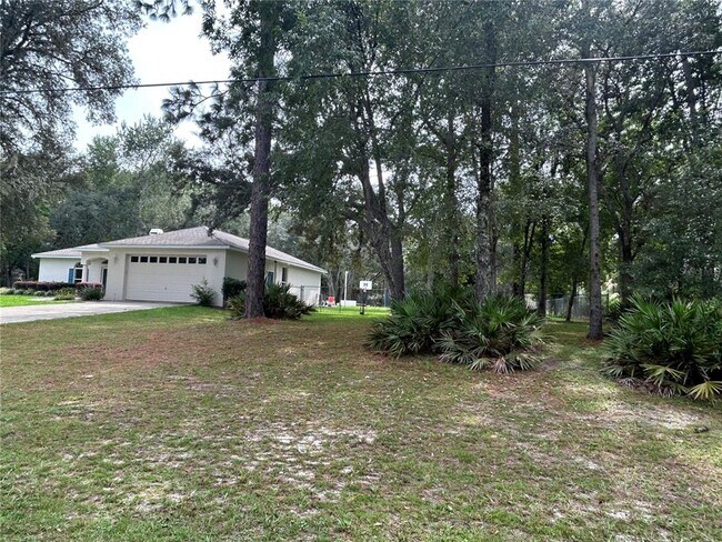 Building Photo - 5774 N Lamp Post Dr