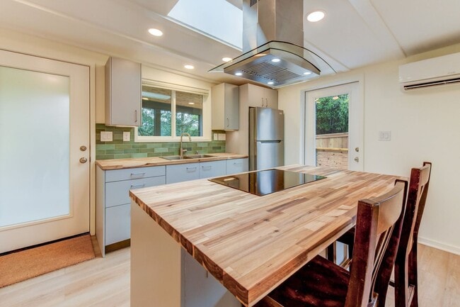 Building Photo - A Fresh, Open Home for a Relaxed Life by the Lake