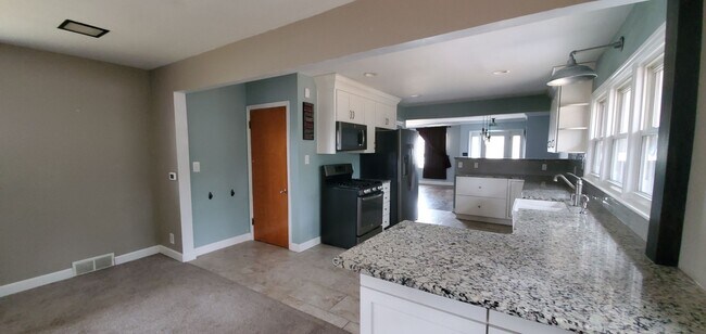 Building Photo - Don't Scroll Past This One!  Renovated, Brick Ranch. 3 Bedrooms, 2 FULL Bathrooms, Basement, Garage!