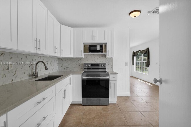 Building Photo - 3541 NW 7th Pl
