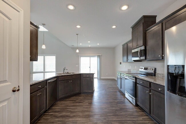 Building Photo - 4BR/3.5BA · 2,809 SF · Owner's Suite on Main · Fenced Yard · Midland, GA — $2,800/mo