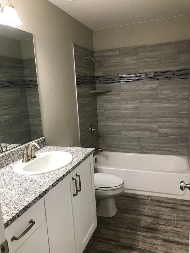 Building Photo - Beautiful 1,735 sq. ft. townhome featuring 3 bedrooms and 2.5 bathrooms!