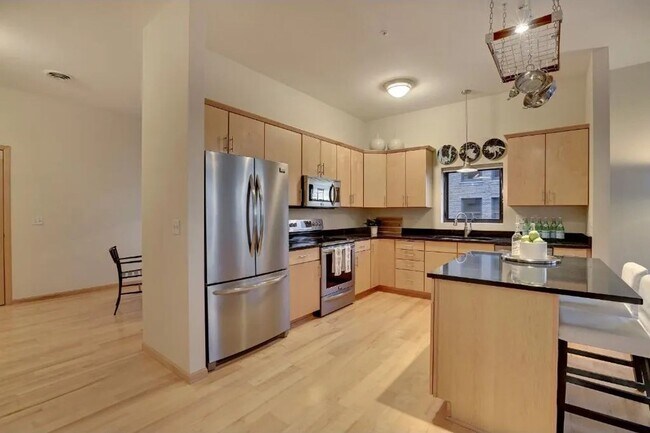 Building Photo - FEBRUARY MOVE-IN SPECIAL FOR QUALIFIED APPLICANTS - Absolutely Gorgeous 2 BR, 2 BA Condo Just Ste...