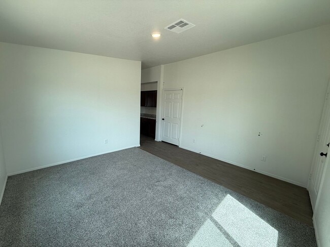 Building Photo - BRAND NEW 4 Bedroom in Desert Sands!