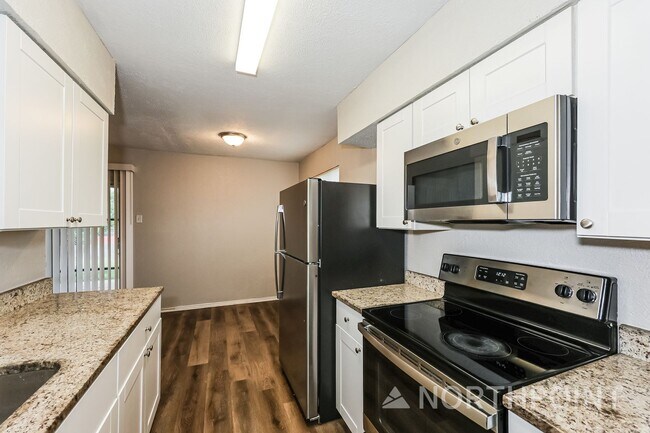 Building Photo - 4 BR/2BA | Newly Renovated Single Family Home | Covered Patio  | Fenced backyard!
