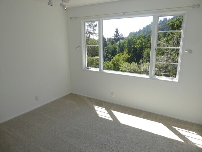 Building Photo - SPACIOUS AND SECLUDED THREE BED / TWO BATH...