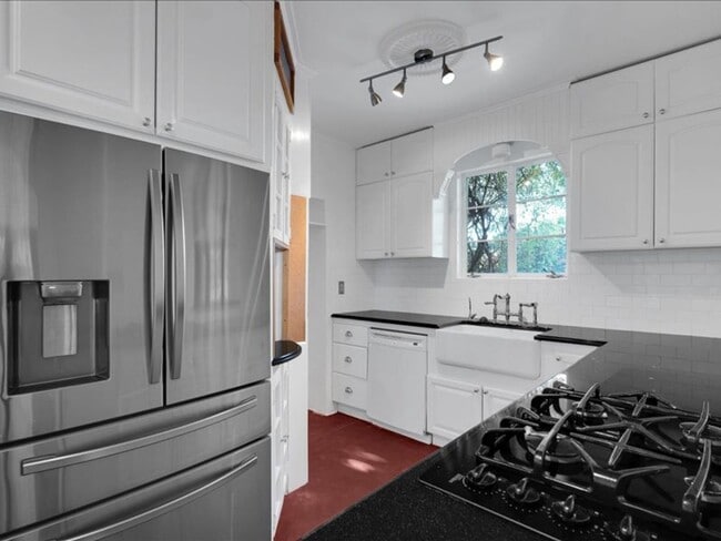 Building Photo - Charming Mission Style Home with Guest House & One Block from Arizona Inn