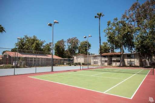 Building Photo - Spacious 2-bedroom 1-bathroom upstairs condo with Balcony/Garage