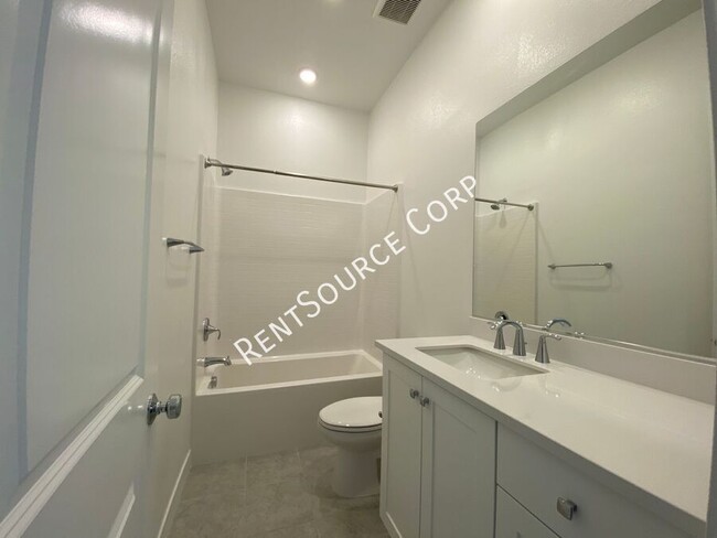 Building Photo - 3 Bedroom, 2022 New Construction Flat w/ S...