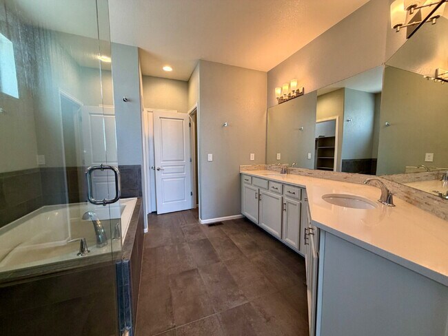 Building Photo - Luxury 4-Bedroom Ranch Featuring a Chef's Kitchen, Spa-Inspired Primary Suite & Finished Basement!!