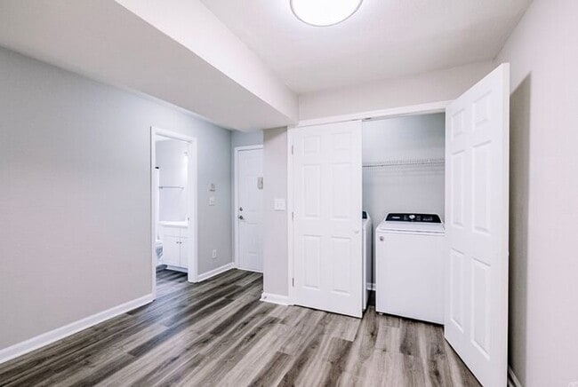 Building Photo - Spacious 2-Bedroom Elite Apartment with Private Balconies & Washer/Dryer