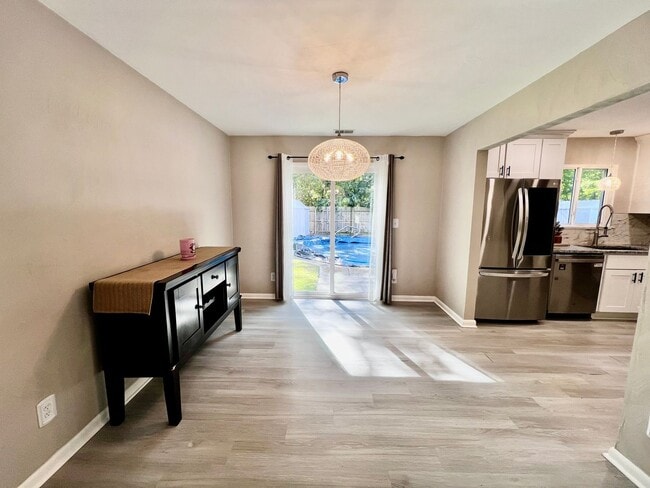 Building Photo - Come see this FULLY renovated two-story tr...