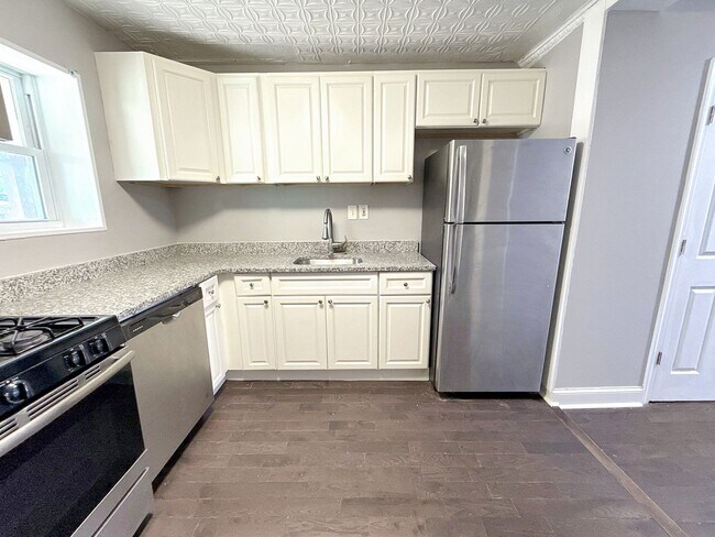 Building Photo - Charming Baltimore Rowhome with Private Backyard & Modern Updates