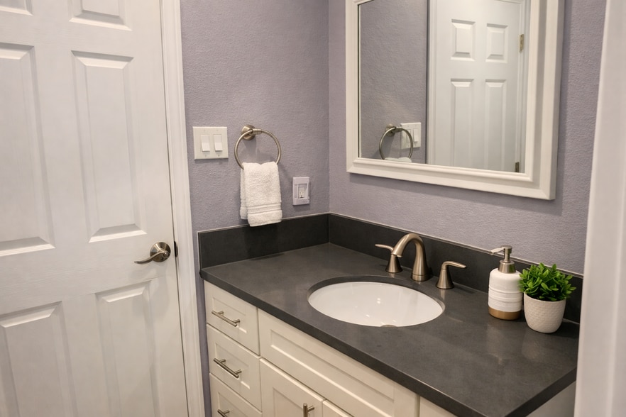Clean, updated bathroom with modern finishes - 1111 North Rd