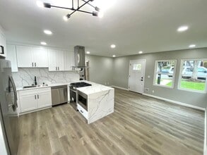 Building Photo - 6353 Malcolm Dr