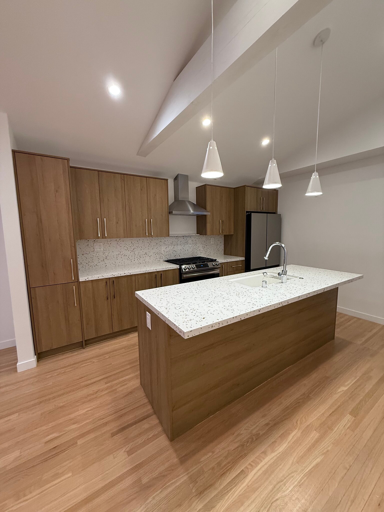 Kitchen Island and Breakfast Nook with Ample Space for Bar Stools - 1156 S Highland Ave