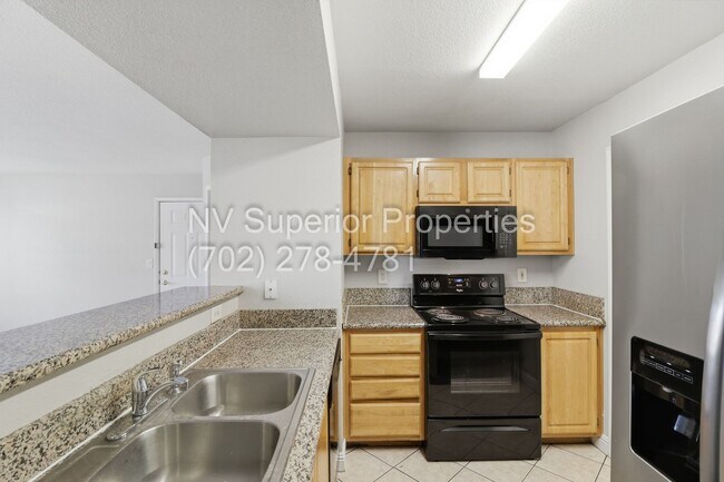 Building Photo - SW!! First floor unit with Balcony!! Gated!! Clubhouse!!  Community pool!! Spa!! Exercise Room!! ...