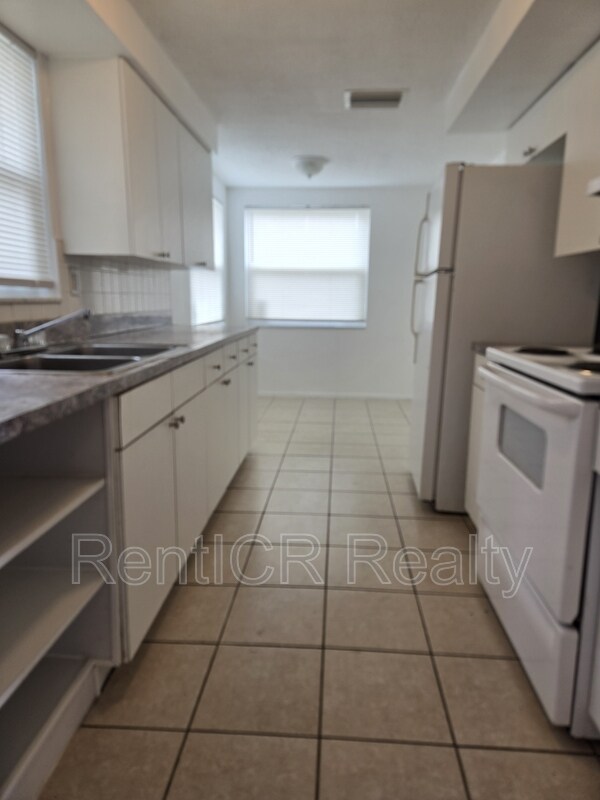 Building Photo - 4836 Flora Ave