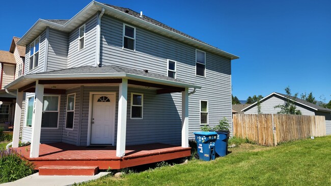 Building Photo - Beautiful House with Yard and Pets Considered