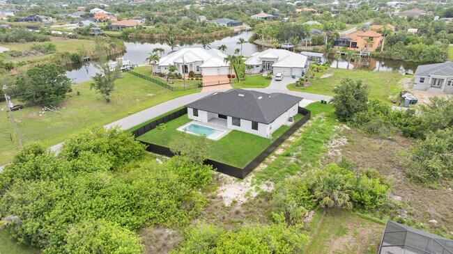 Building Photo - Brand-New Pool Home for Rent – Port Charlo...