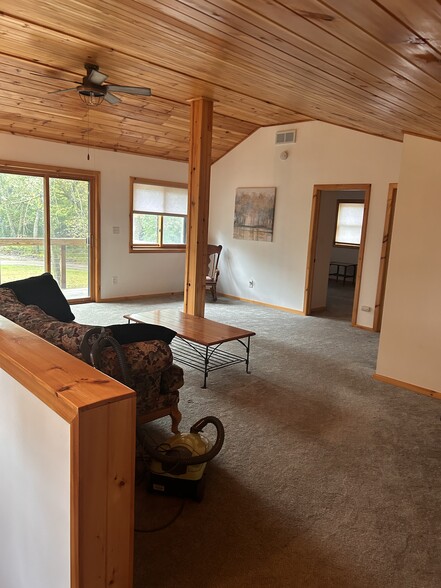 Living room and 2 bedrooms with full bathroom on 2nd floor. - 12275 62nd St NE