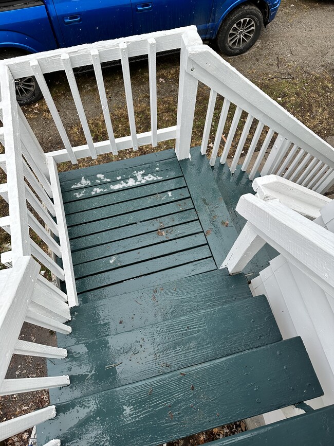 Stairs to upper unit. They do have slip tape on them as well (after pic was taken) - 606 W 5th St