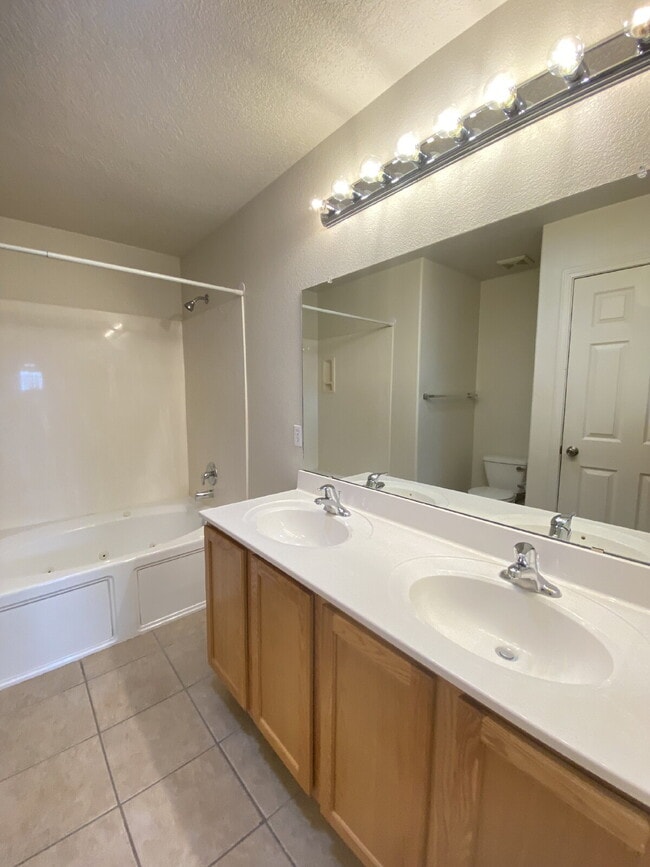 Building Photo - GATED COMMUNITY - 2 Story Townhouse - All BR Upper Level