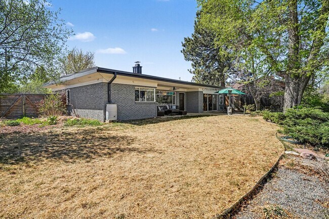 Building Photo - Sunlit Wheat Ridge Gem with Huge Wooded Backyard