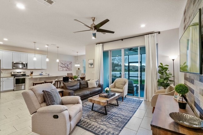 Building Photo - Water Front Home- 4 Large Bedrooms-3 baths Gated Community Call Sheila Campbell 407-687-7900