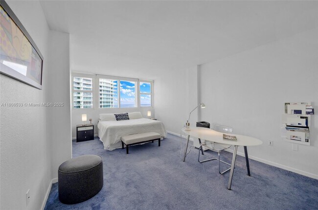 Building Photo - 10275 Collins Ave