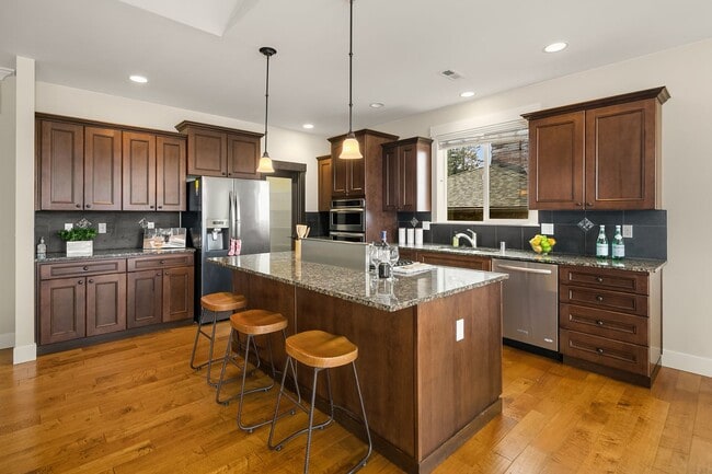 Building Photo - Water Views| Expansive Deck | Flexible Living Spaces