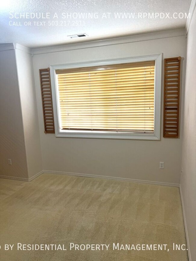 Building Photo - 6463 NW Wenmarie Dr