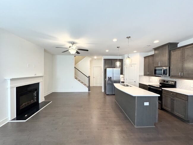 Building Photo - Stylish 3BR Townhome with Private Yard & T...