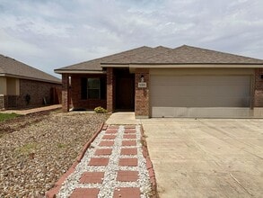 Building Photo - 9309 Sagebrush Ave