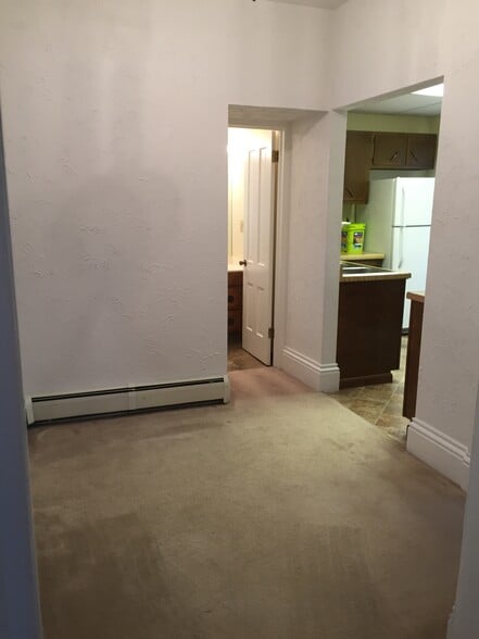 View from entry door, door to porch on left. - 406 Poplar St