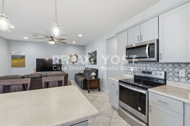 Building Photo - Move-In Ready Desert Gem with Stylish Furnishings & Private Backyard!