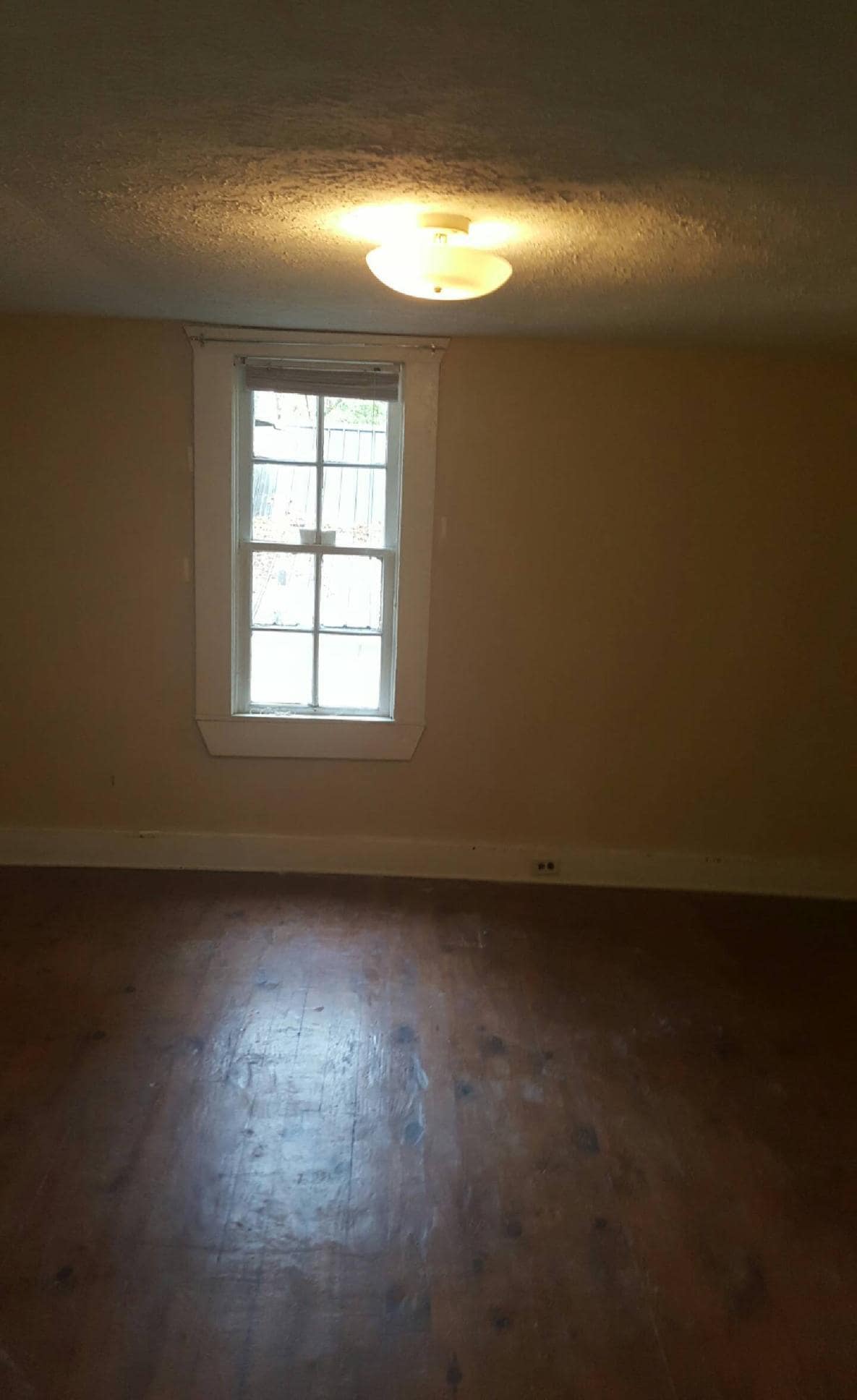 Main, larger bedroom. - 109 1/2 Tuggle Street